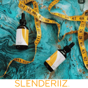 Two bottles of weightloss supplements with a measuring tape